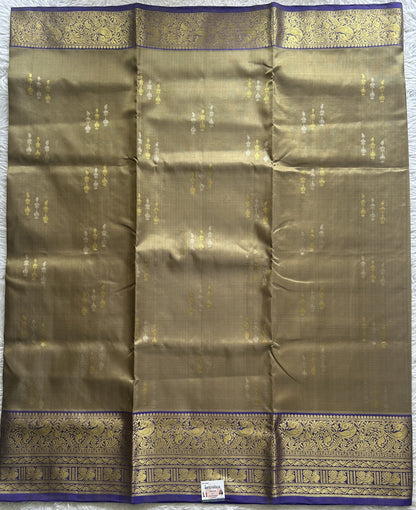 Venkatagiri Pattu Saree Olive Green Colored Complemented With a Zari Border.