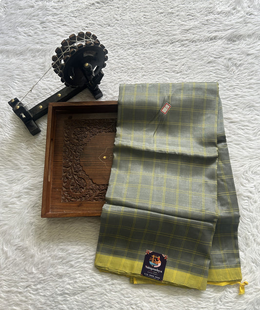 Mangalagiri Plain Pattu Saree Gray colored complemented with a No Border.