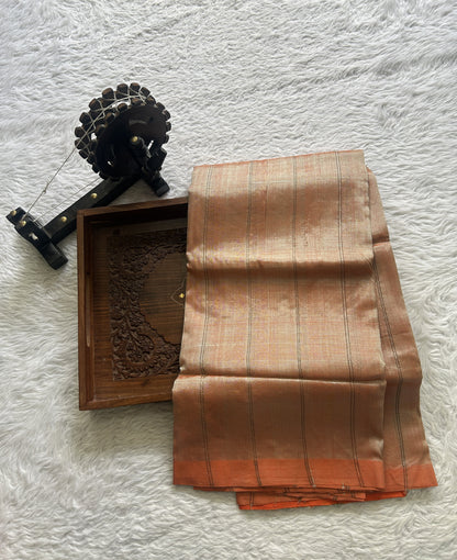 Mangalagiri Plain Pattu Saree Light Orange colored complemented with a No Border.