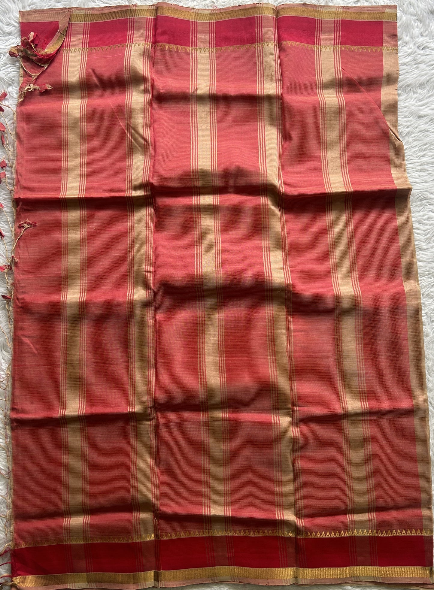 Mangalagiri Plain Pattu Saree Light Brown colored complemented with a Zari Border.