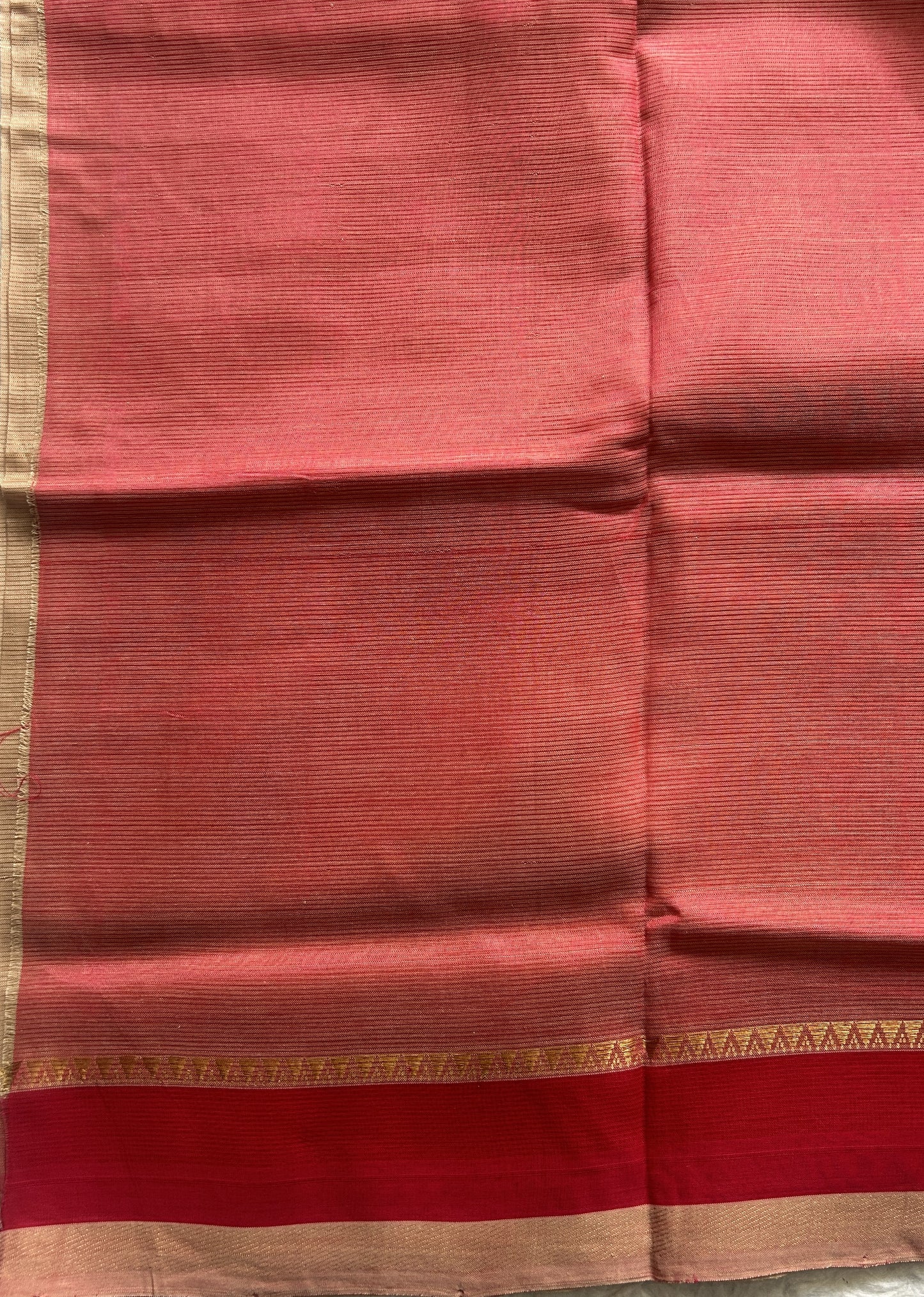 Mangalagiri Plain Pattu Saree Light Brown colored complemented with a Zari Border.