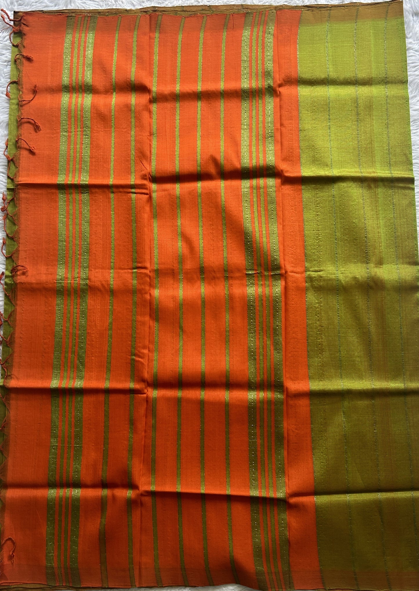 Mangalagiri Plain Pattu Saree Light Green colored complemented with a No Border.