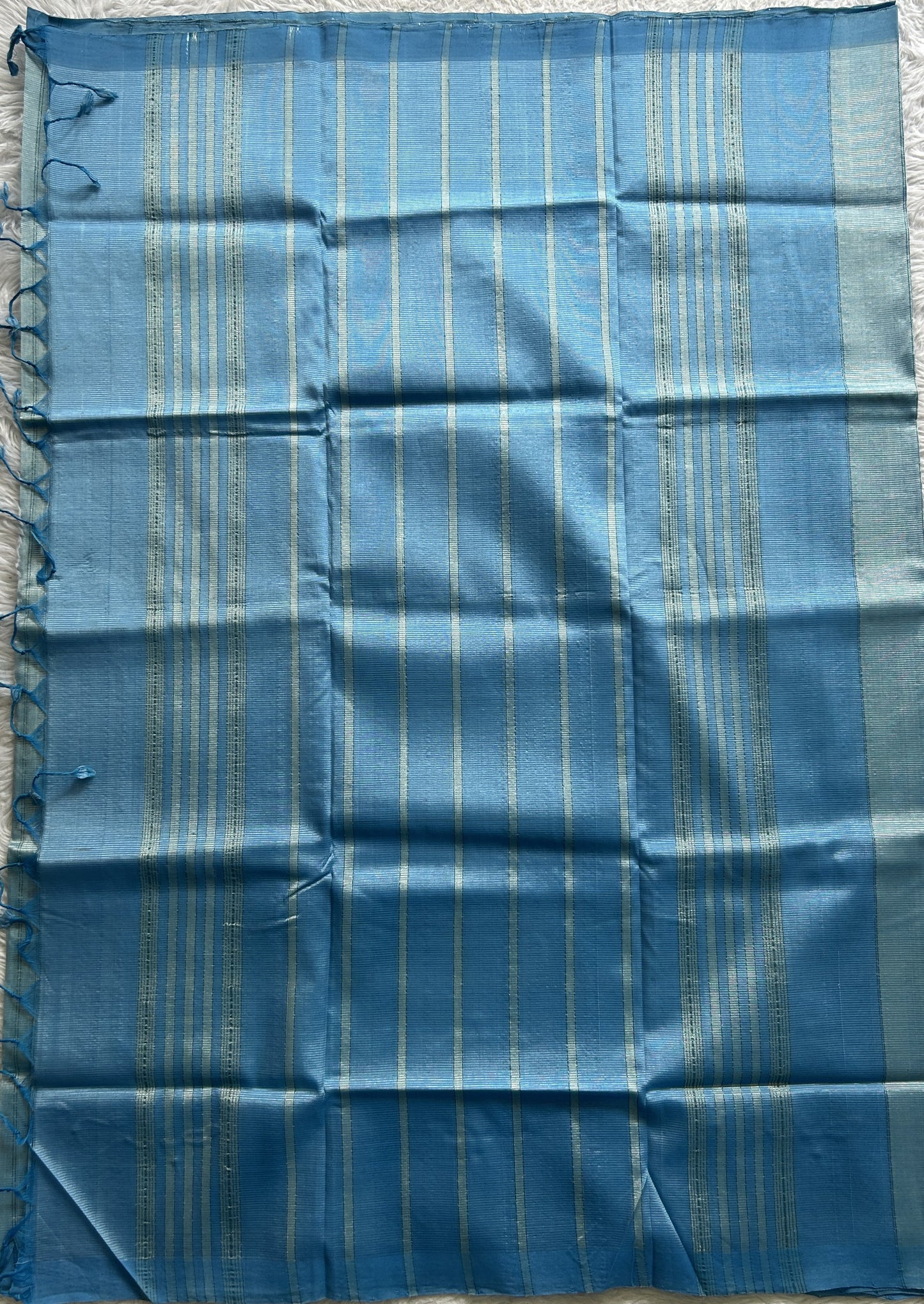 Mangalagiri Plain Pattu Saree Sky Blue colored complemented with a No Border.