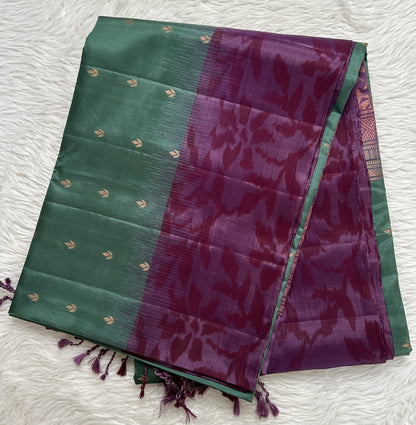 Kanjivaram Festive Soft Silk Saree Bottle Green colored Saree complemented with a Violet Colored Pochampally border. - Sampradaya Designer Studio