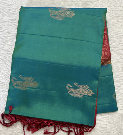 Kanjivaram Festive Soft Silk Saree Peacock Blue colored Saree complemented with a Deep Pink Colored Pochampally border. - Sampradaya Designer Studio