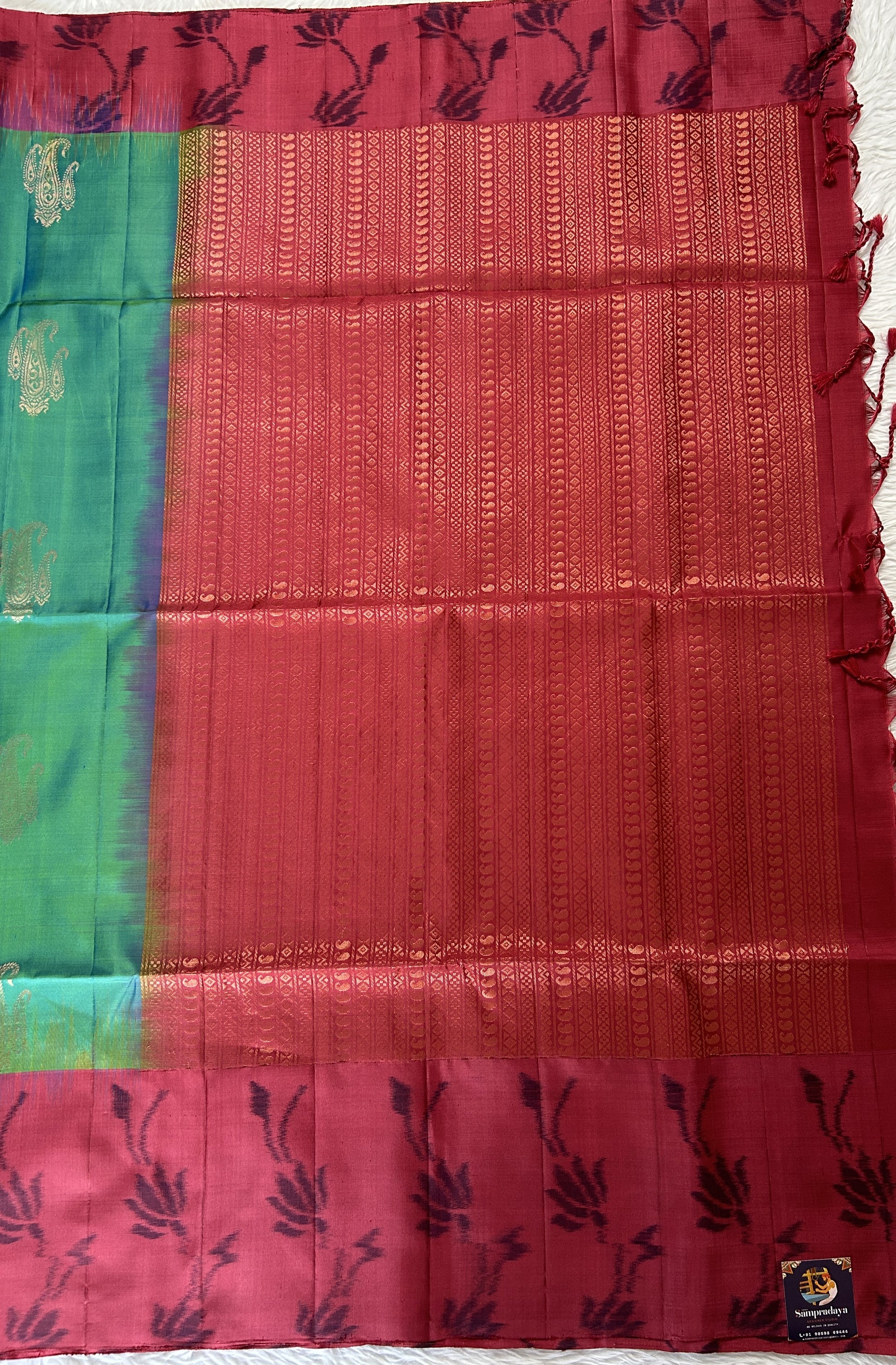 Kanjivaram Festive Soft Silk Saree Peacock Blue colored Saree complemented with a Deep Pink Colored Pochampally border. - Sampradaya Designer Studio