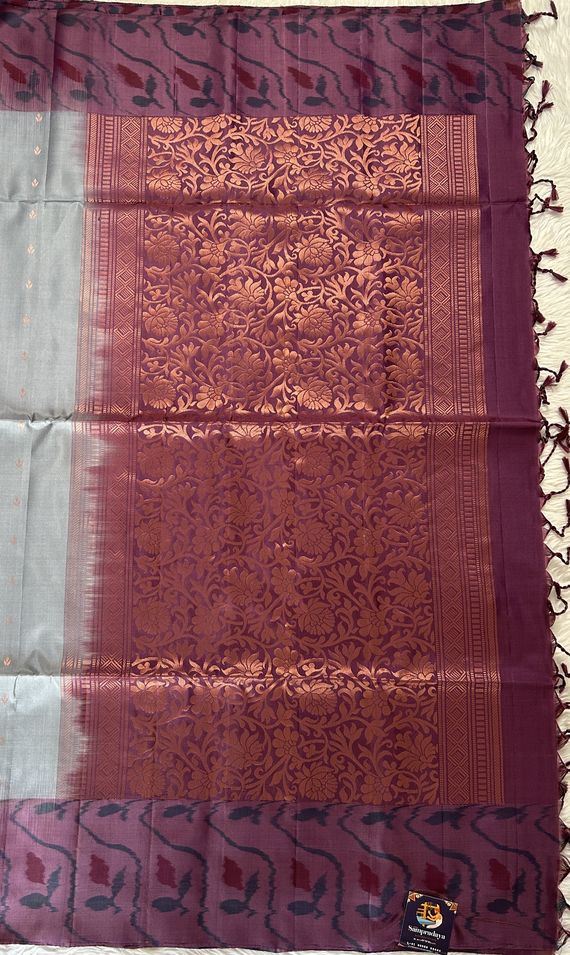 Kanjivaram Festive Soft Silk Saree Gray colored Saree complemented with a Magenta Colored Pochampally border. - Sampradaya Designer Studio