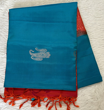 Kanjivaram Festive Soft Silk Saree Blue colored Saree complemented with a Orange Pochampally border. - Sampradaya Designer Studio