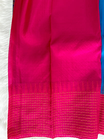 Gadwal Pattu Saree Rama Blue colored saree complemented with a Pink Kanchi border - Sampradaya Designer Studio