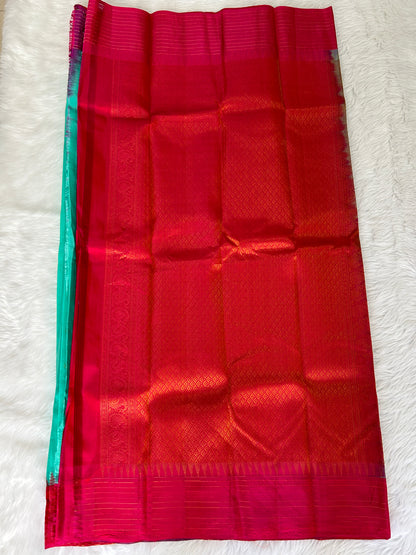 Gadwal Pattu Saree Sea Green colored saree complemented with a Rani Pink checks border - Sampradaya Designer Studio