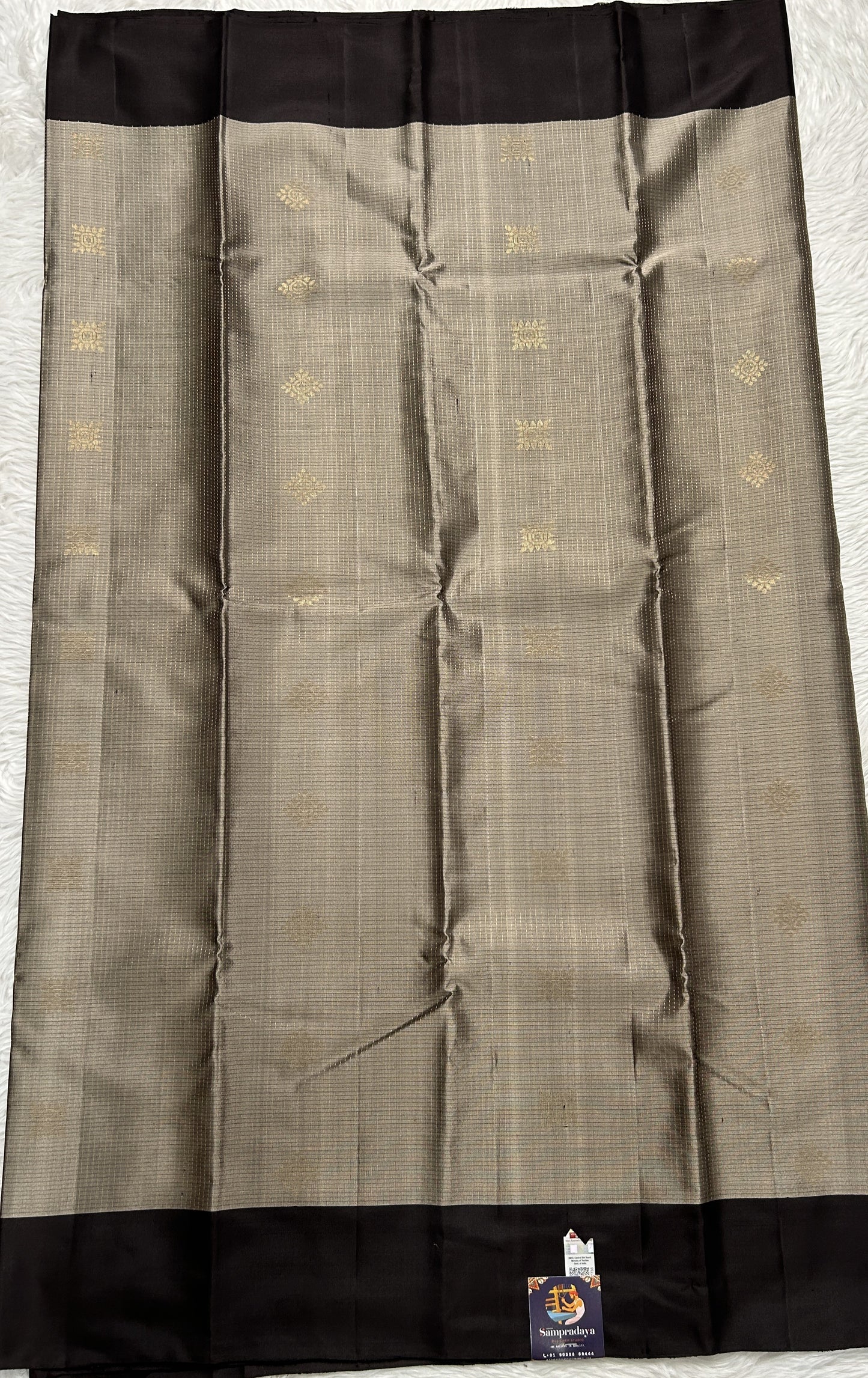 Kanjivaram Festive Soft Silk Saree Snuff colored complemented with a Brown Colored Plain border. - Sampradaya Designer Studio