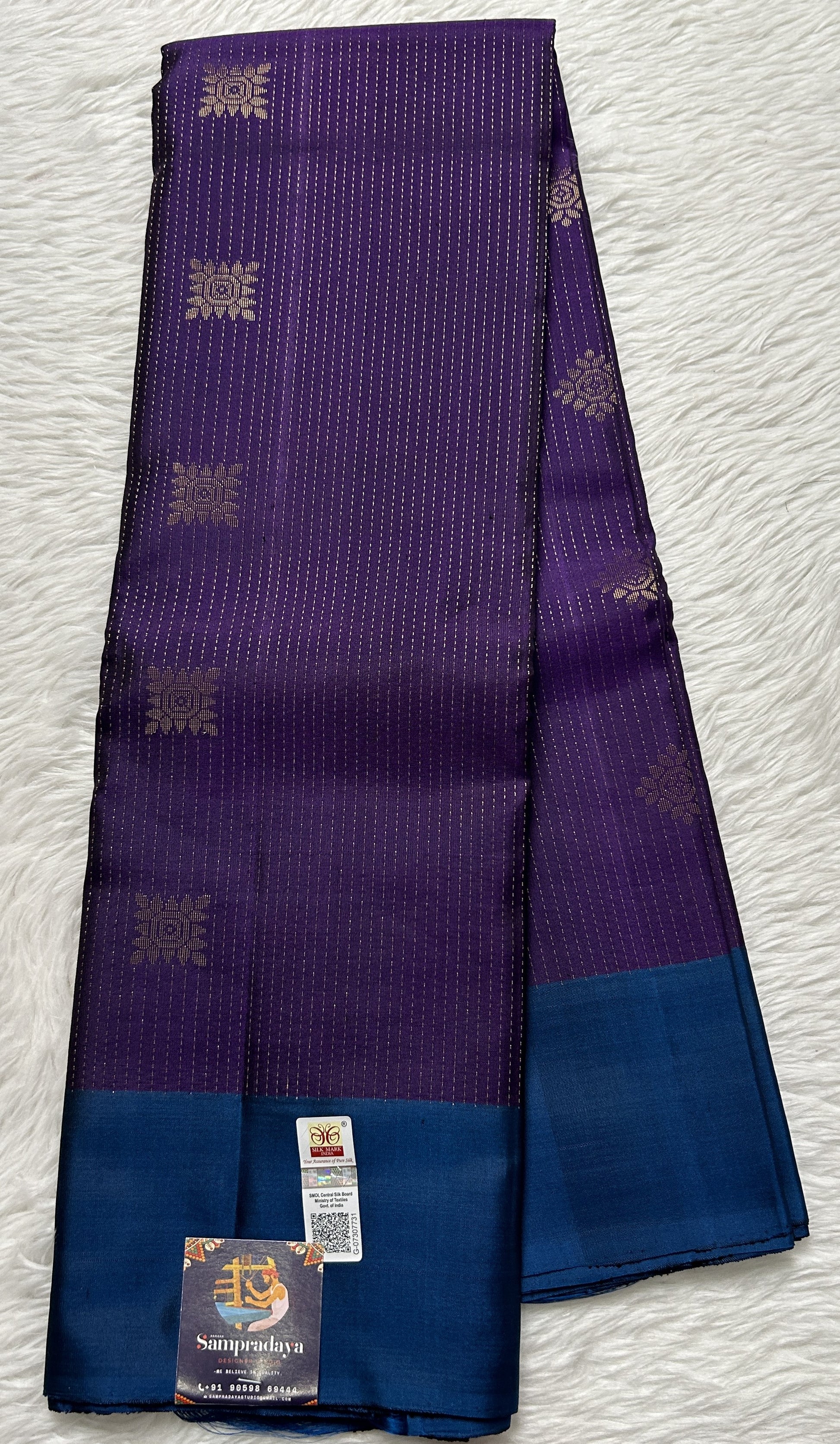 Kanjivaram Festive Soft Silk Saree Purple colored complemented with a Peacock Blue Colored Plain border. - Sampradaya Designer Studio