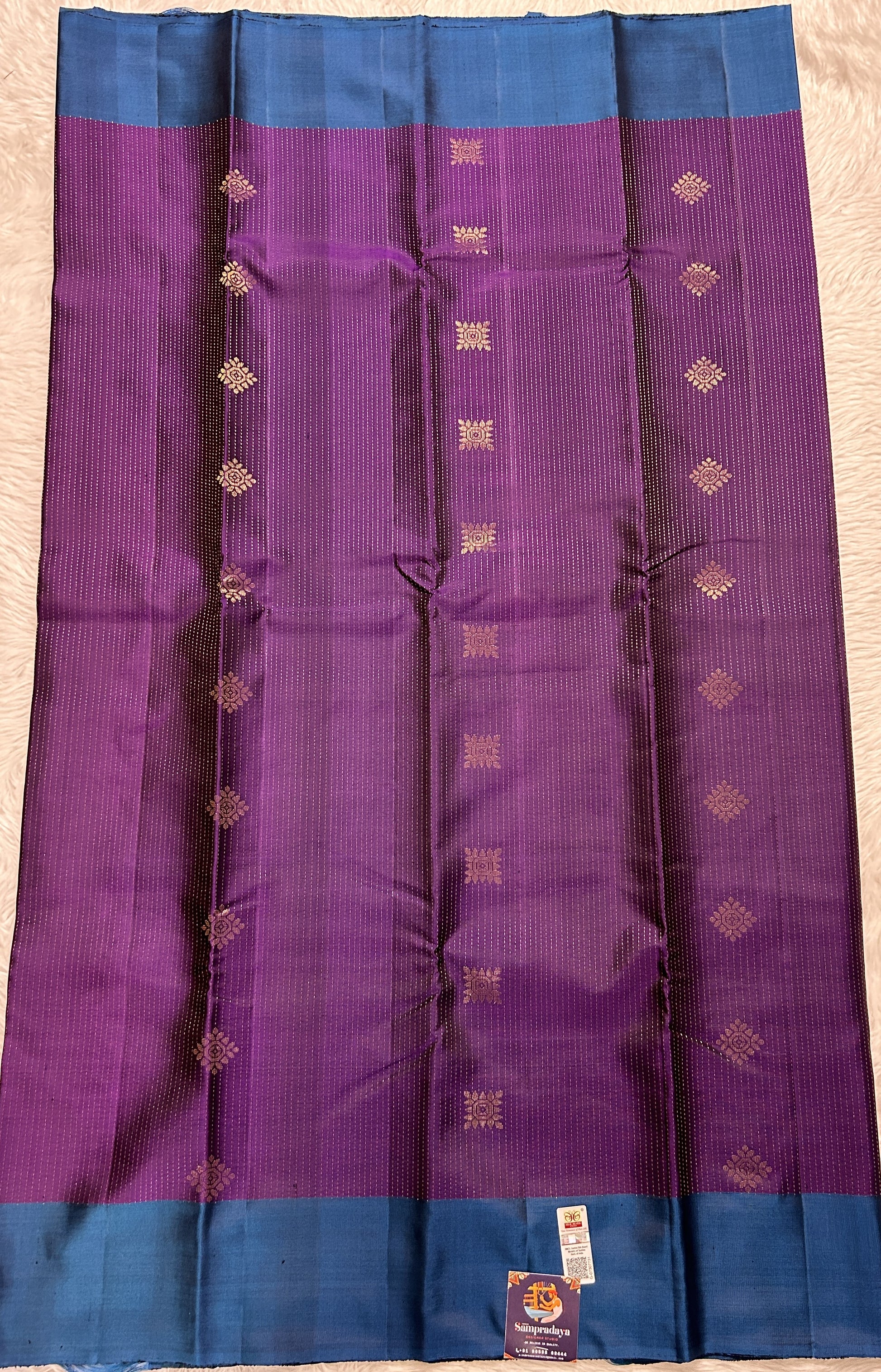 Kanjivaram Festive Soft Silk Saree Purple colored complemented with a Peacock Blue Colored Plain border. - Sampradaya Designer Studio