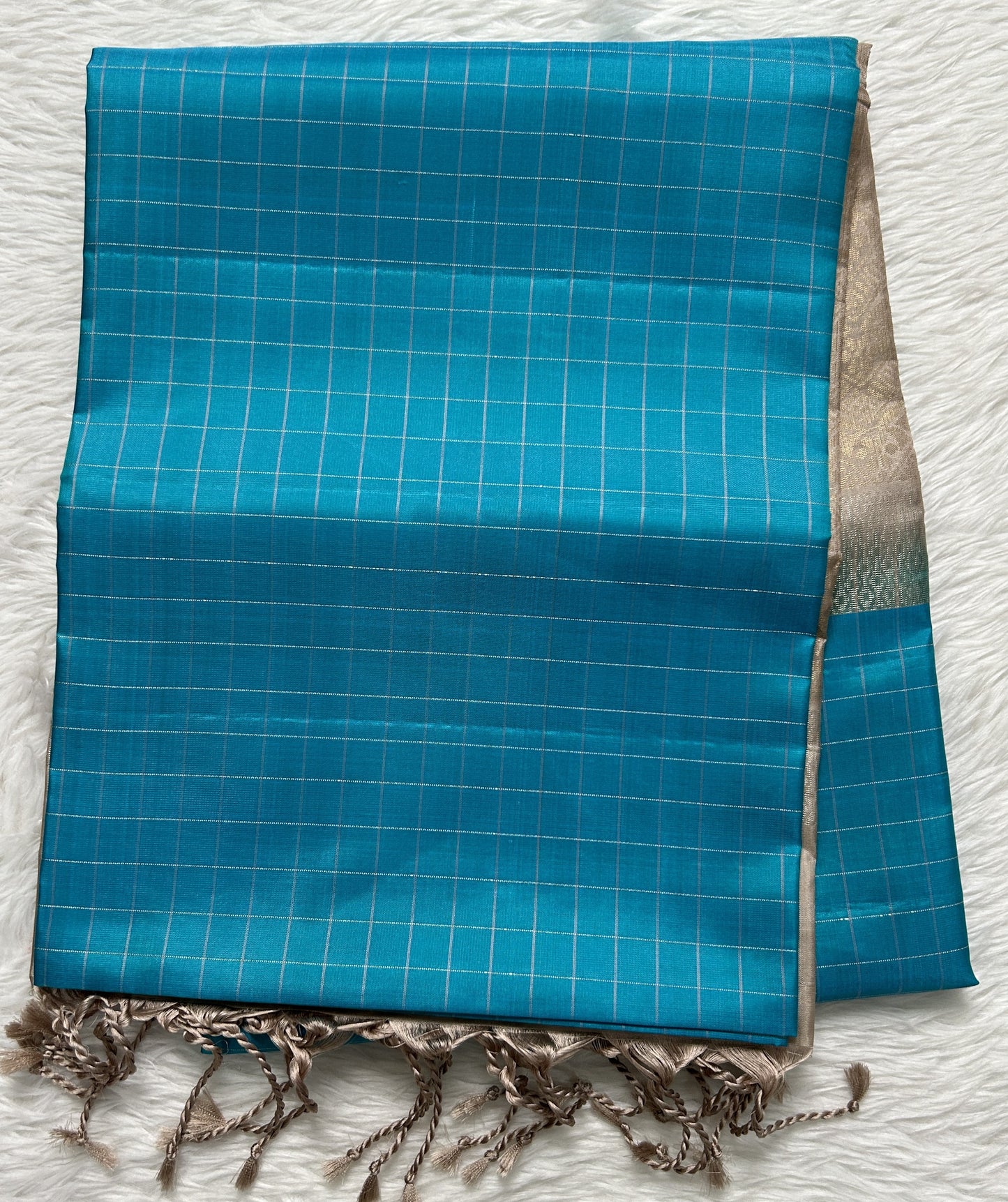 Kanjivaram Festive Soft Silk Saree Blue colored complemented with a Cream Colored Kanchi border. - Sampradaya Designer Studio