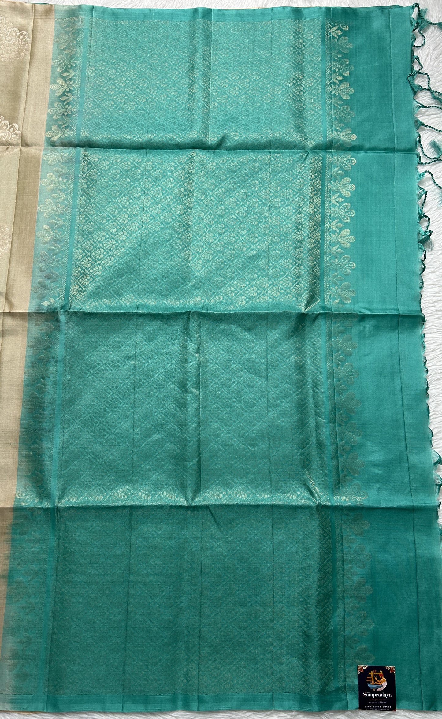 Kanjivaram Festive Soft Silk Saree Biscuit colored complemented with a borderless Saree. - Sampradaya Designer Studio