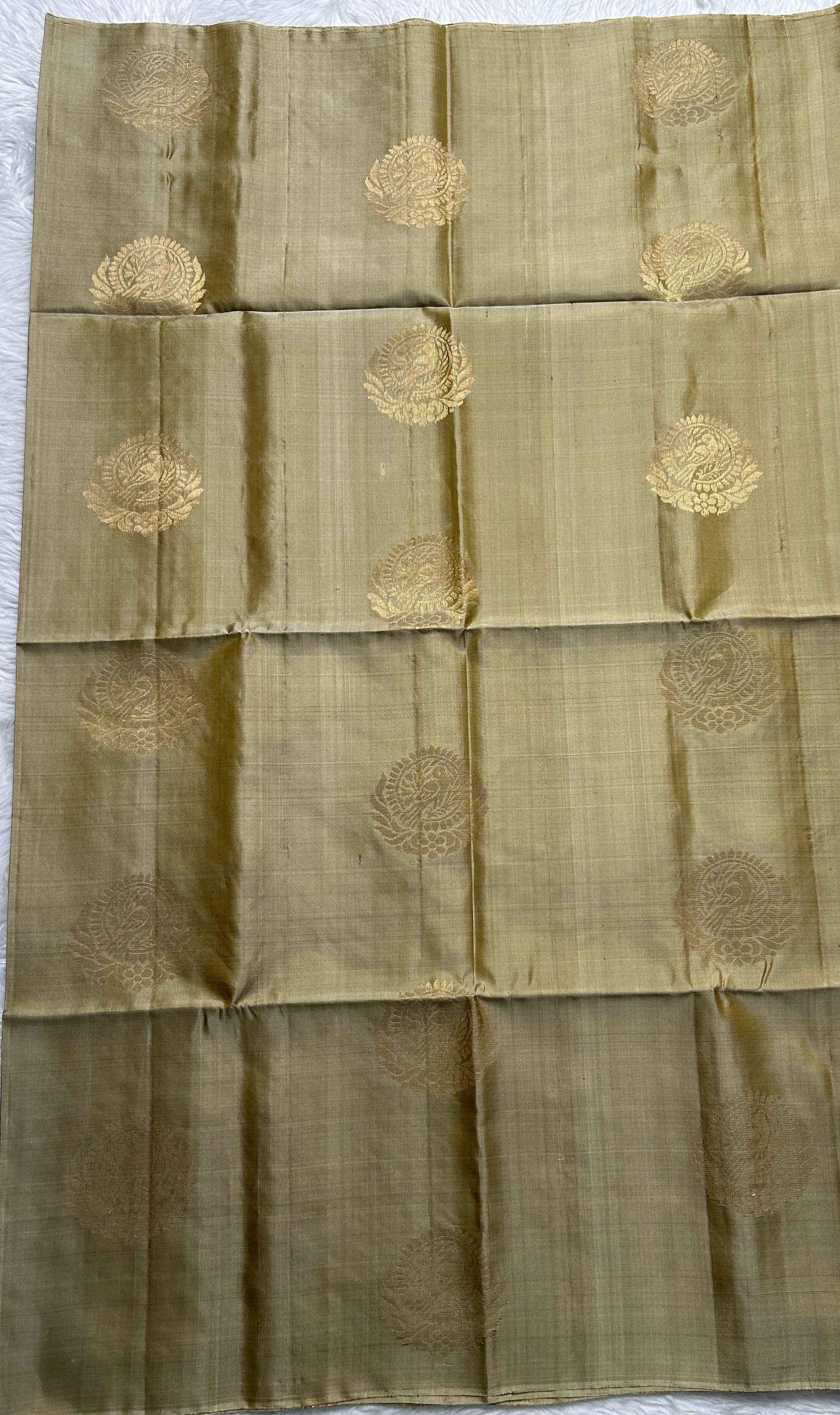 Kanjivaram Festive Soft Silk Saree Cream colored complemented with a borderless Saree. - Sampradaya Designer Studio