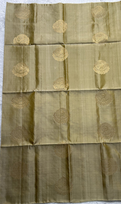 Kanjivaram Festive Soft Silk Saree Cream colored complemented with a borderless Saree. - Sampradaya Designer Studio