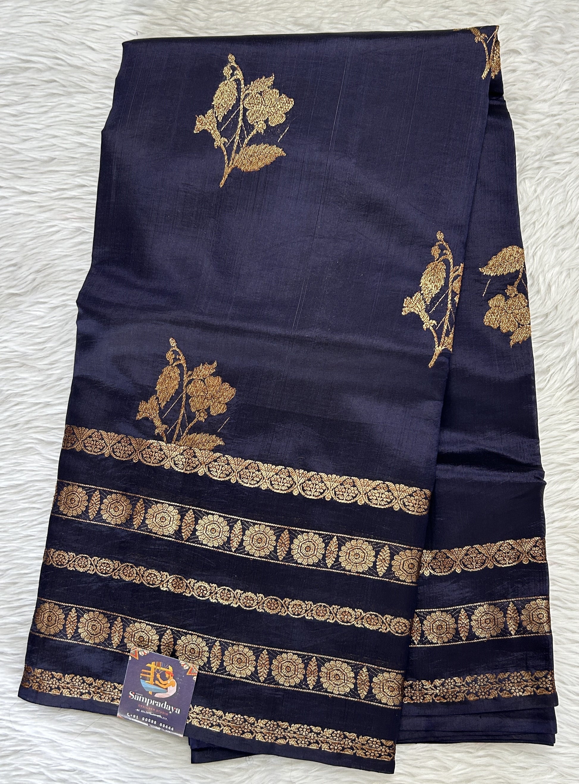 Raw Mango or Pooniya Silk Saree Ink Blue Colored Complemented With a Gap Border - Sampradaya Designer Studio