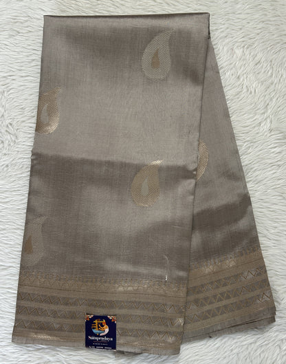 Raw Mango or Pooniya Silk Saree Gray Colored Complemented With a Zari Border - Sampradaya Designer Studio