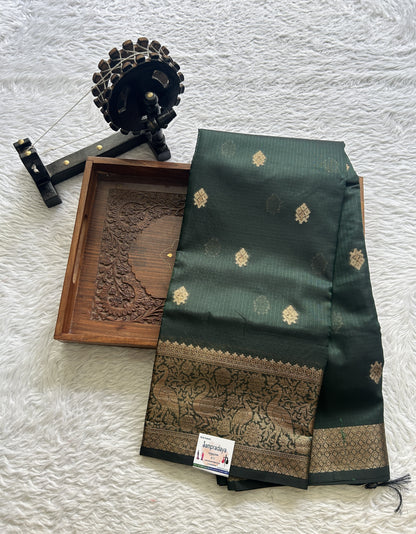 Silk kota Saree Bottle Green colored Complemented with a Zari Border. - Sampradaya Designer Studio