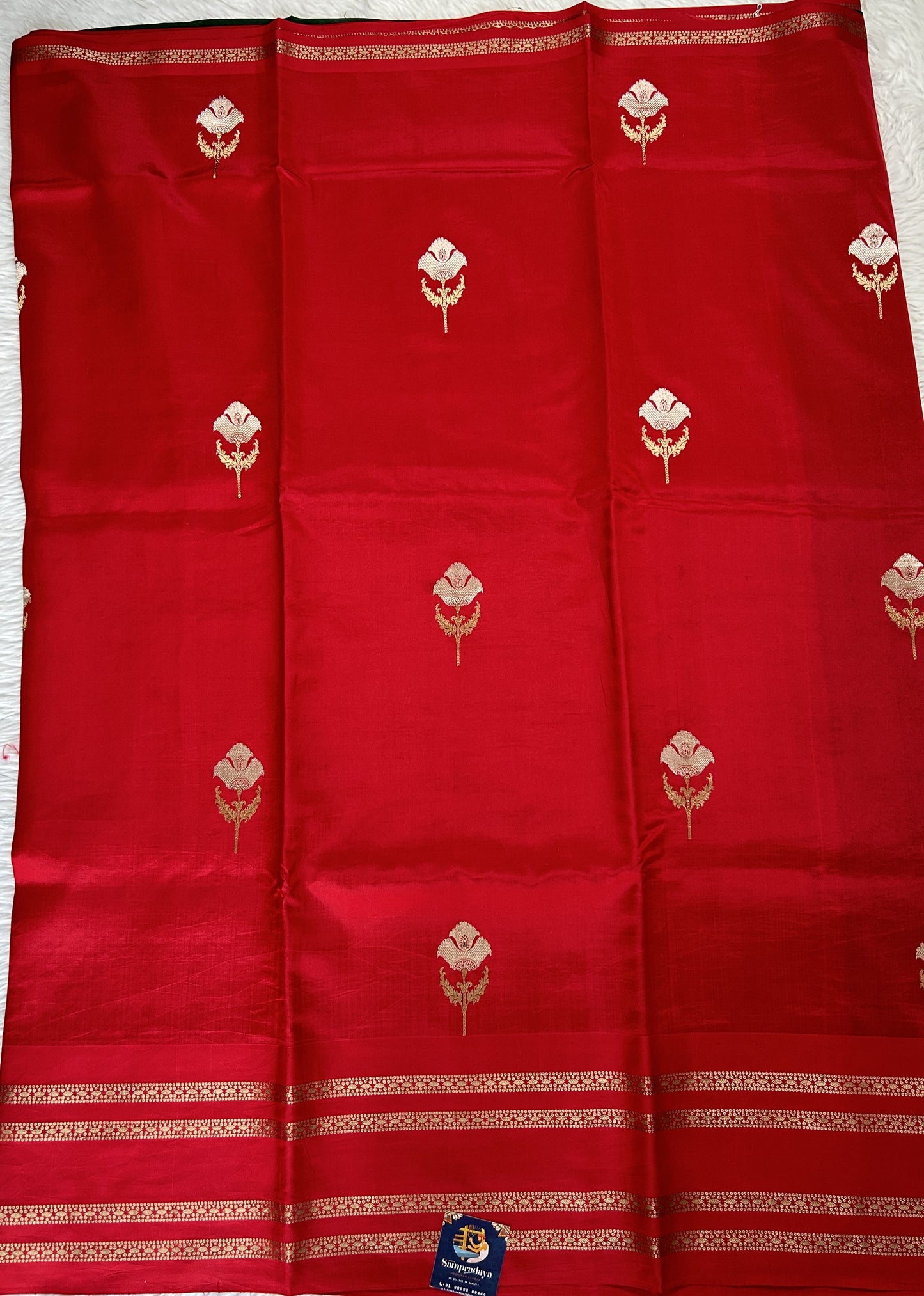 Raw Mango or Pooniya Silk Saree Red Colored Complemented With a Zari Gap Border - Sampradaya Designer Studio