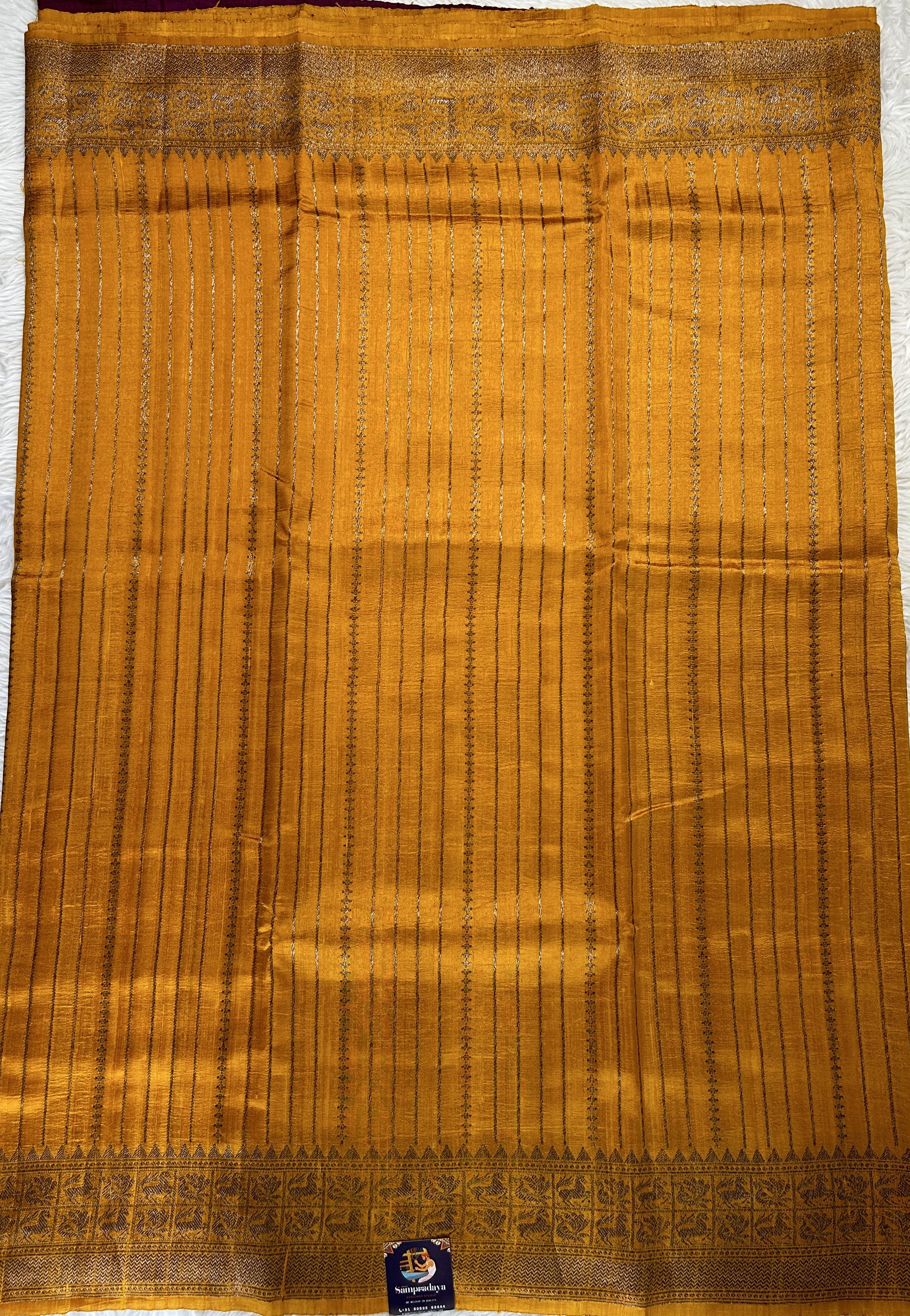 Banarasi Raw Silk Sarees Yellow Colored Complemented With a Intricate Weaving Border - Sampradaya Designer Studio