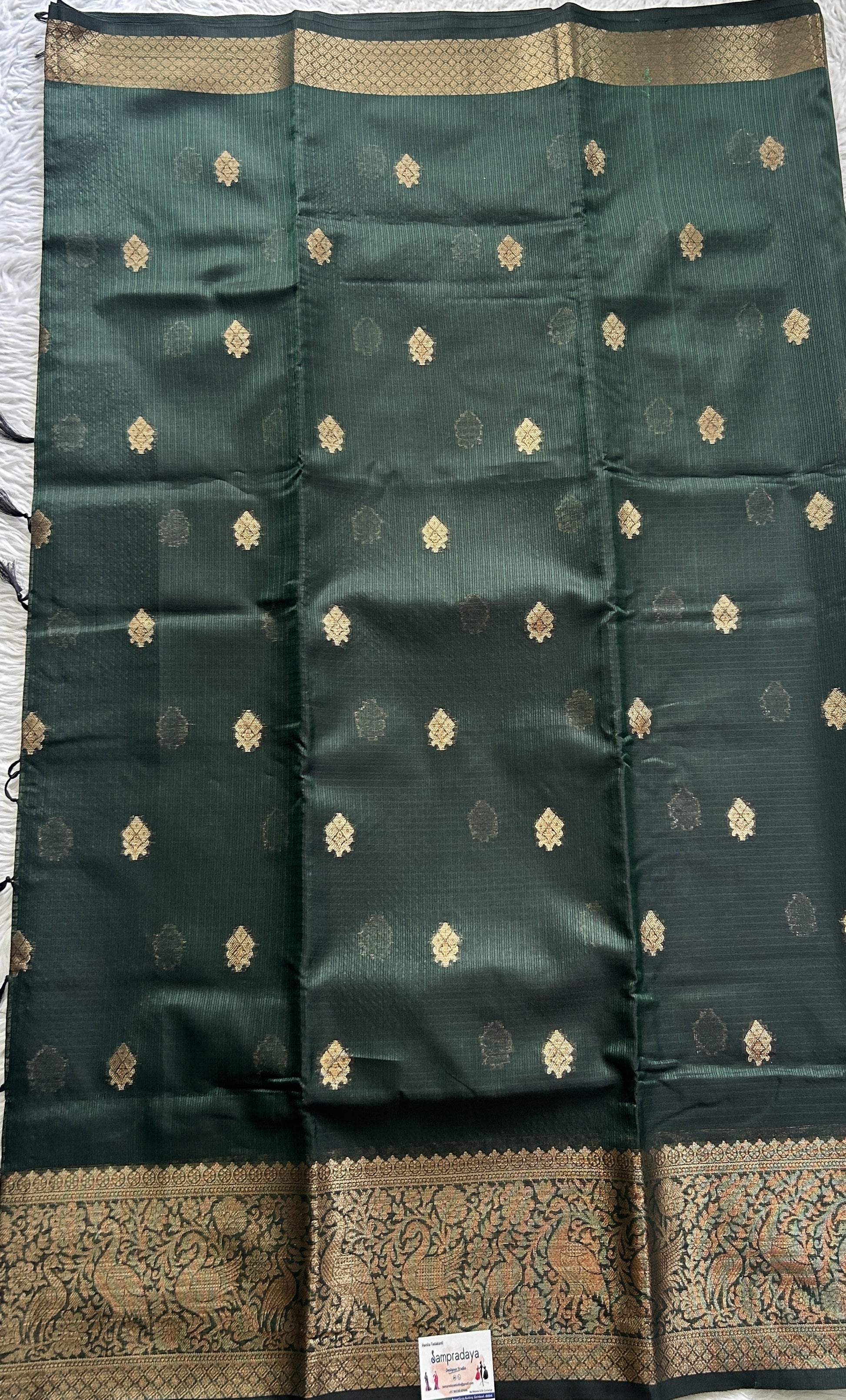 Silk kota Saree Bottle Green colored Complemented with a Zari Border. - Sampradaya Designer Studio