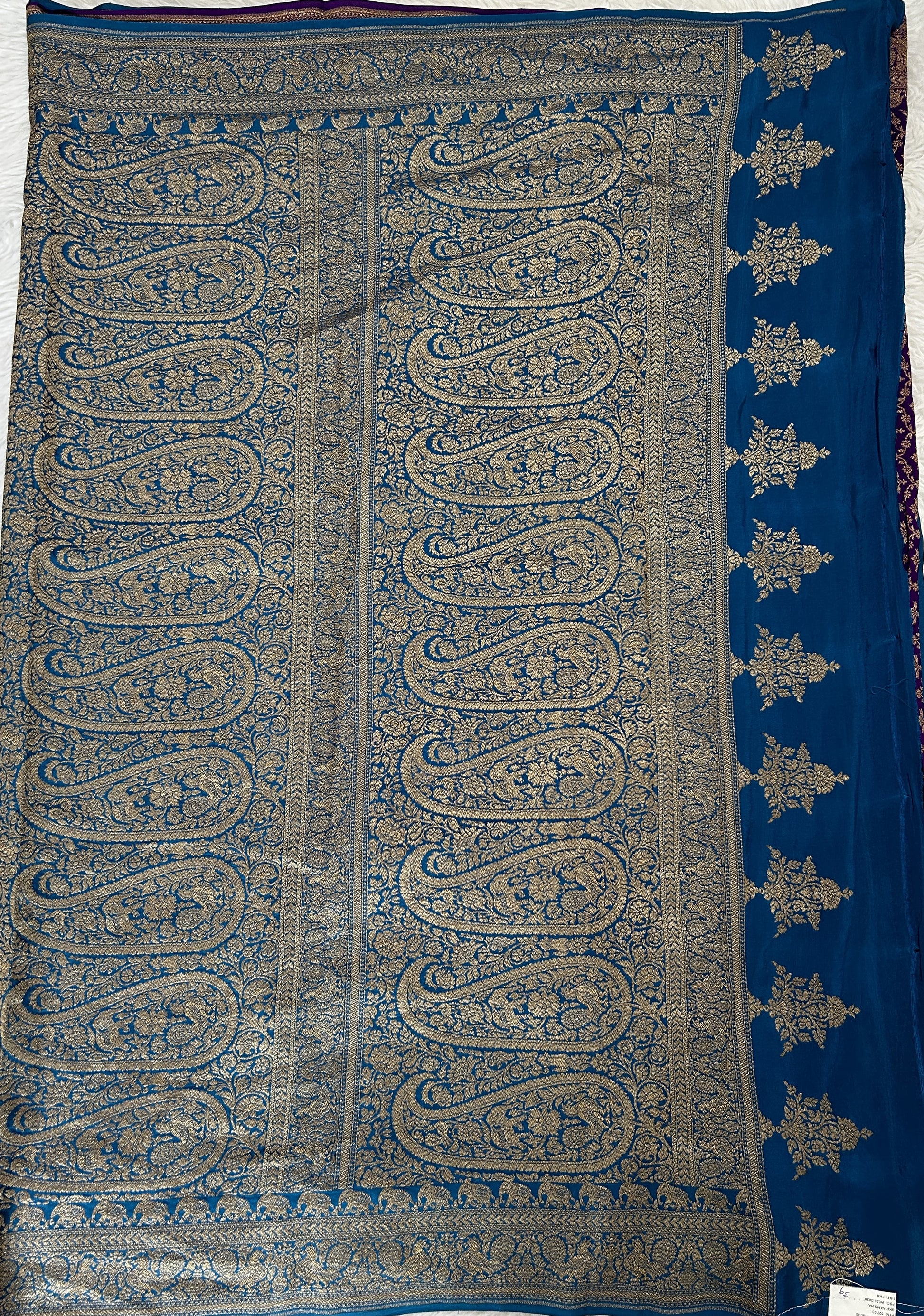 Banarasi Georgette Saree Peacock Blue Colored Complemented with a Zari Border. - Sampradaya Designer Studio