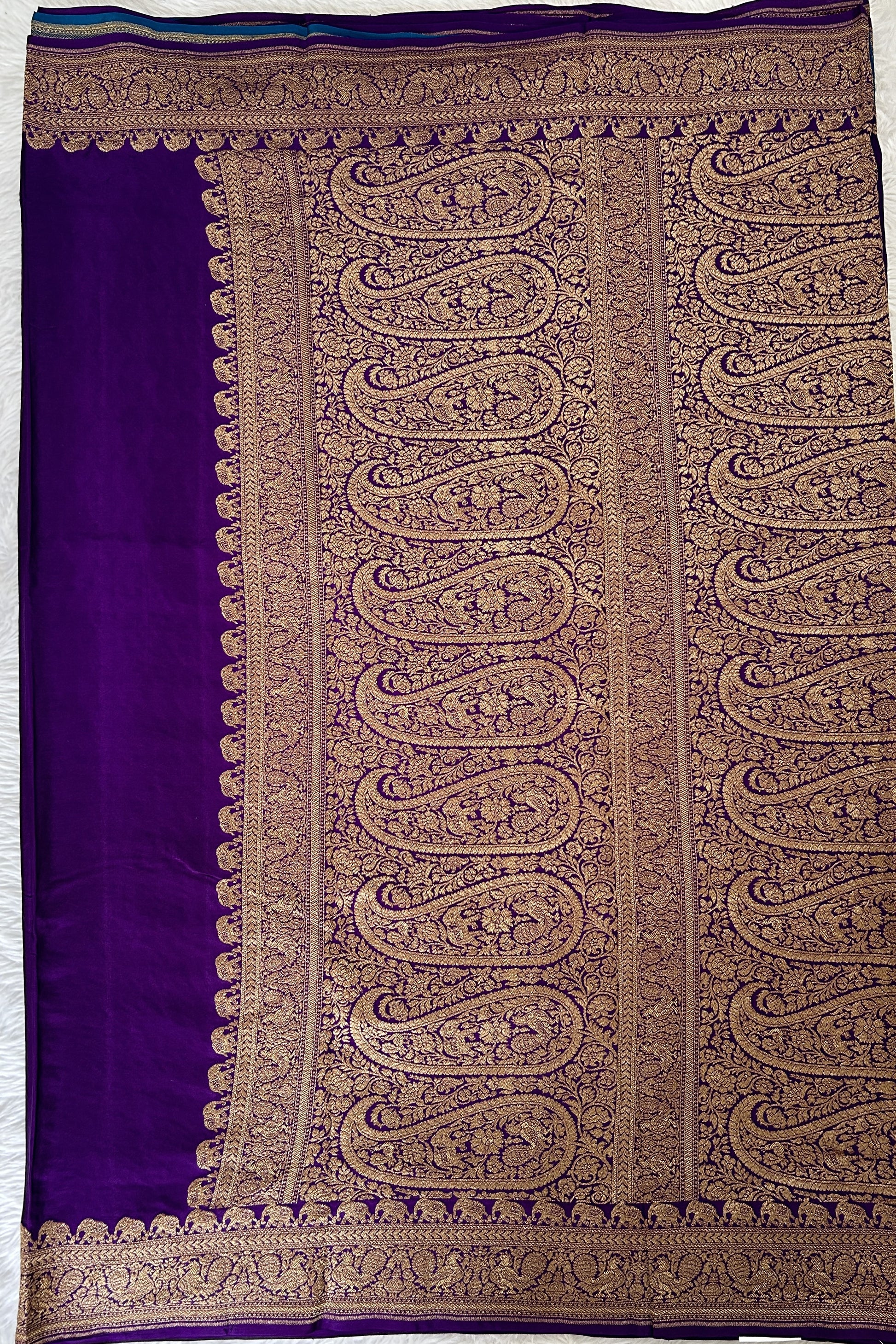 Banarasi Georgette Saree Purple Colored Complemented with a Zari Border. - Sampradaya Designer Studio