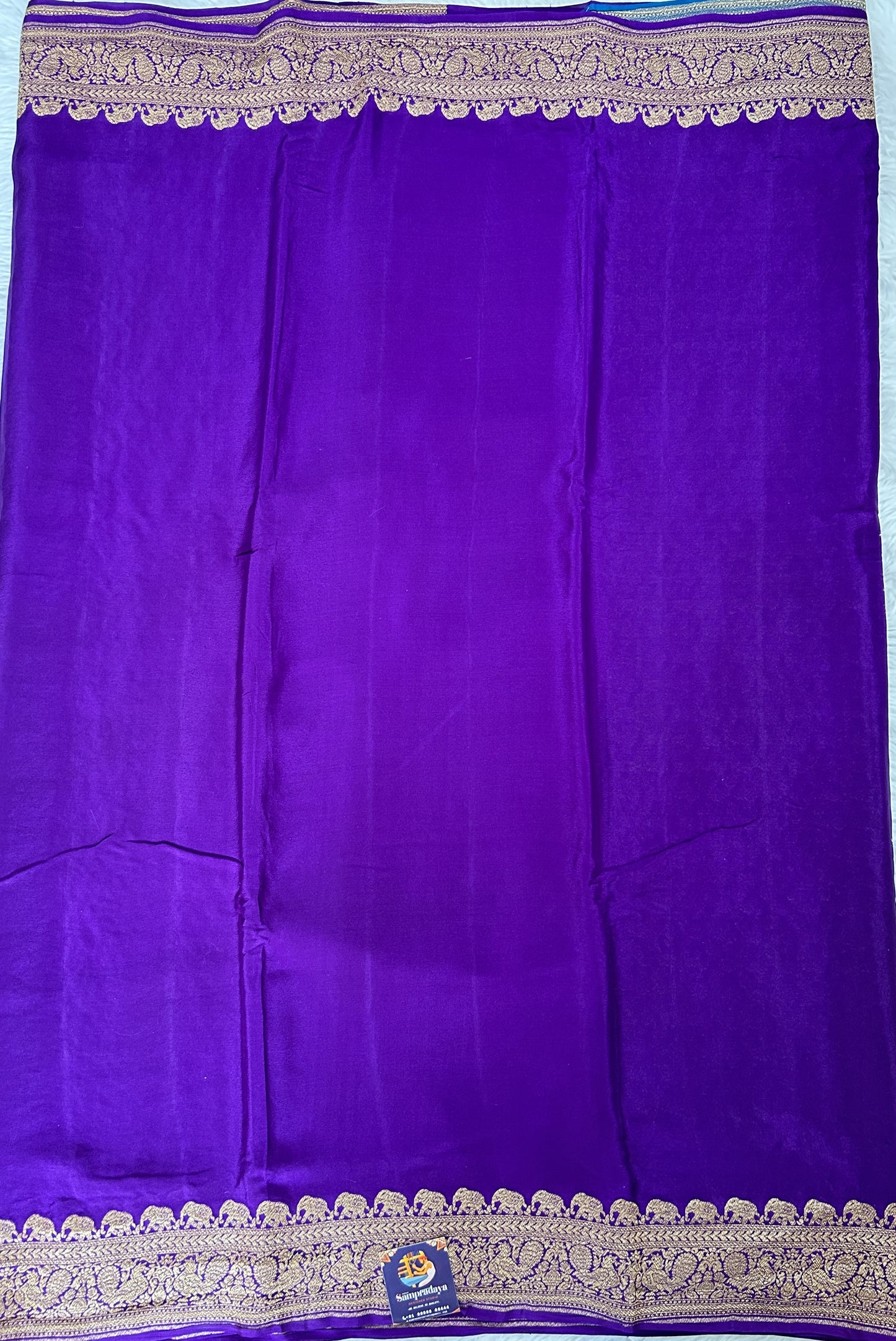 Banarasi Georgette Saree Purple Colored Complemented with a Zari Border. - Sampradaya Designer Studio