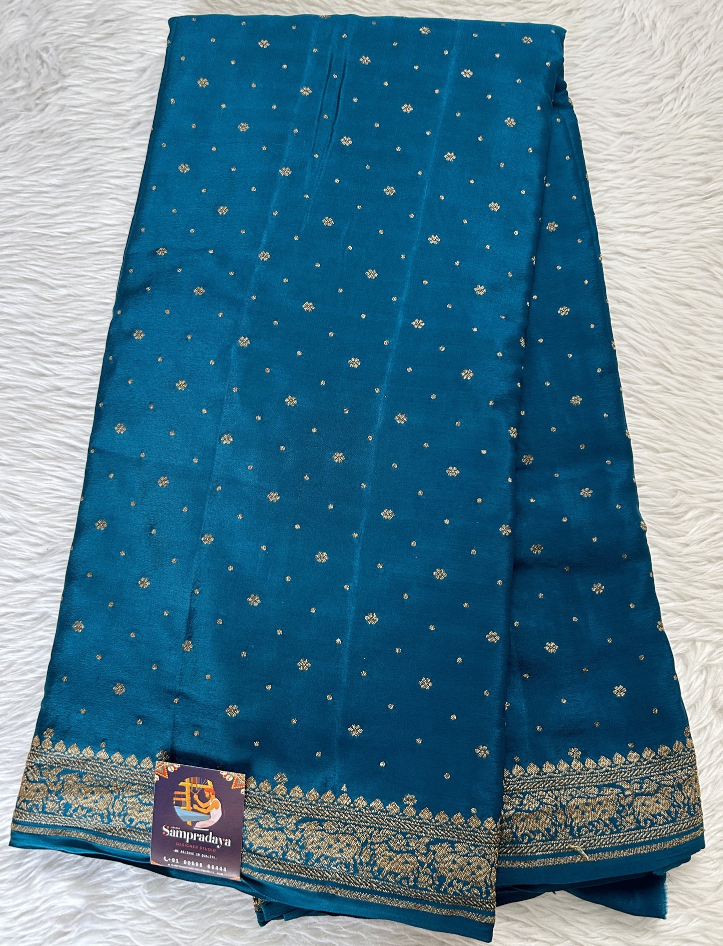 Banarasi Georgette Saree Rama Blue Colored Complemented with a Zari Border. - Sampradaya Designer Studio