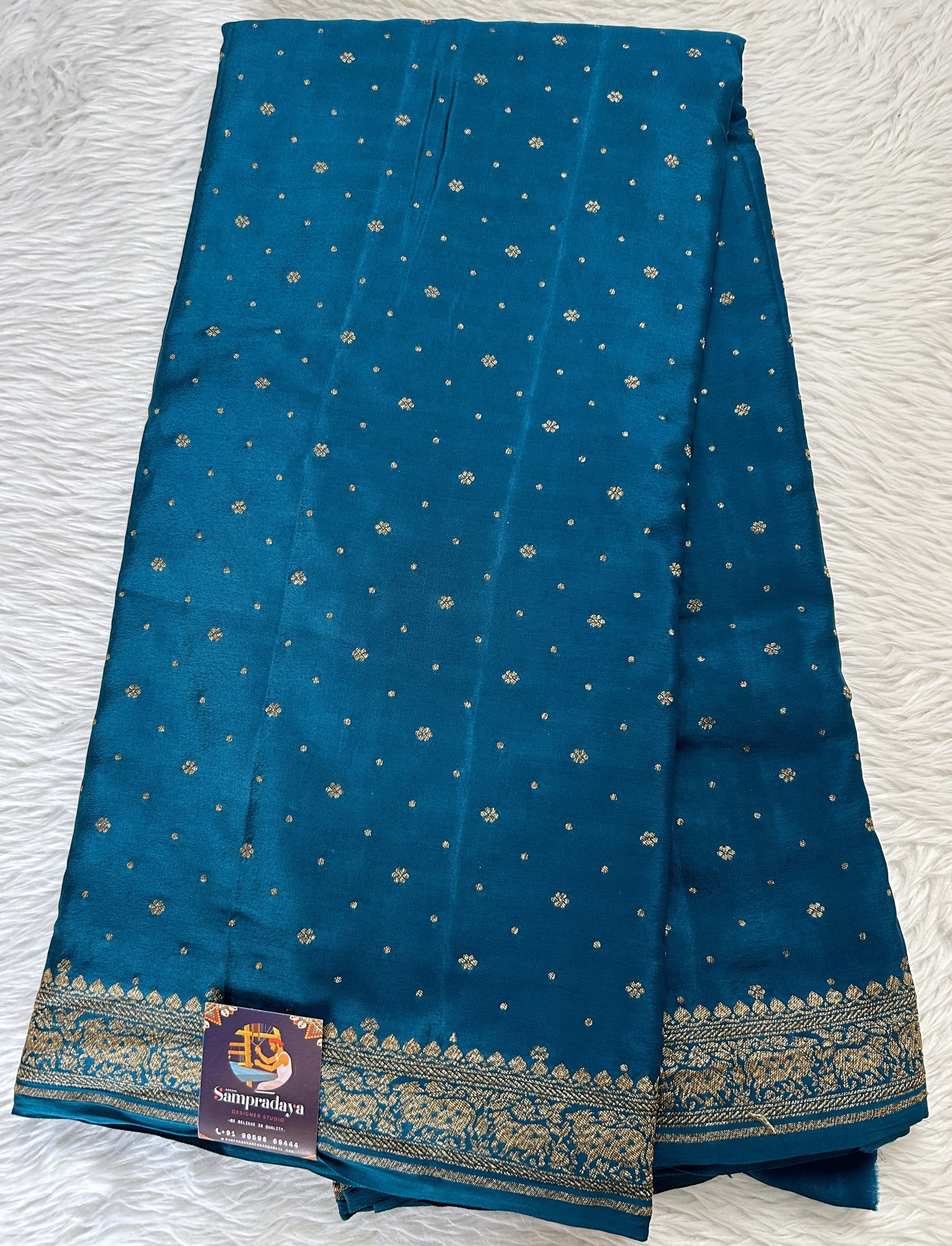 Banarasi Georgette Saree Rama Blue Colored Complemented with a Zari Border. - Sampradaya Designer Studio