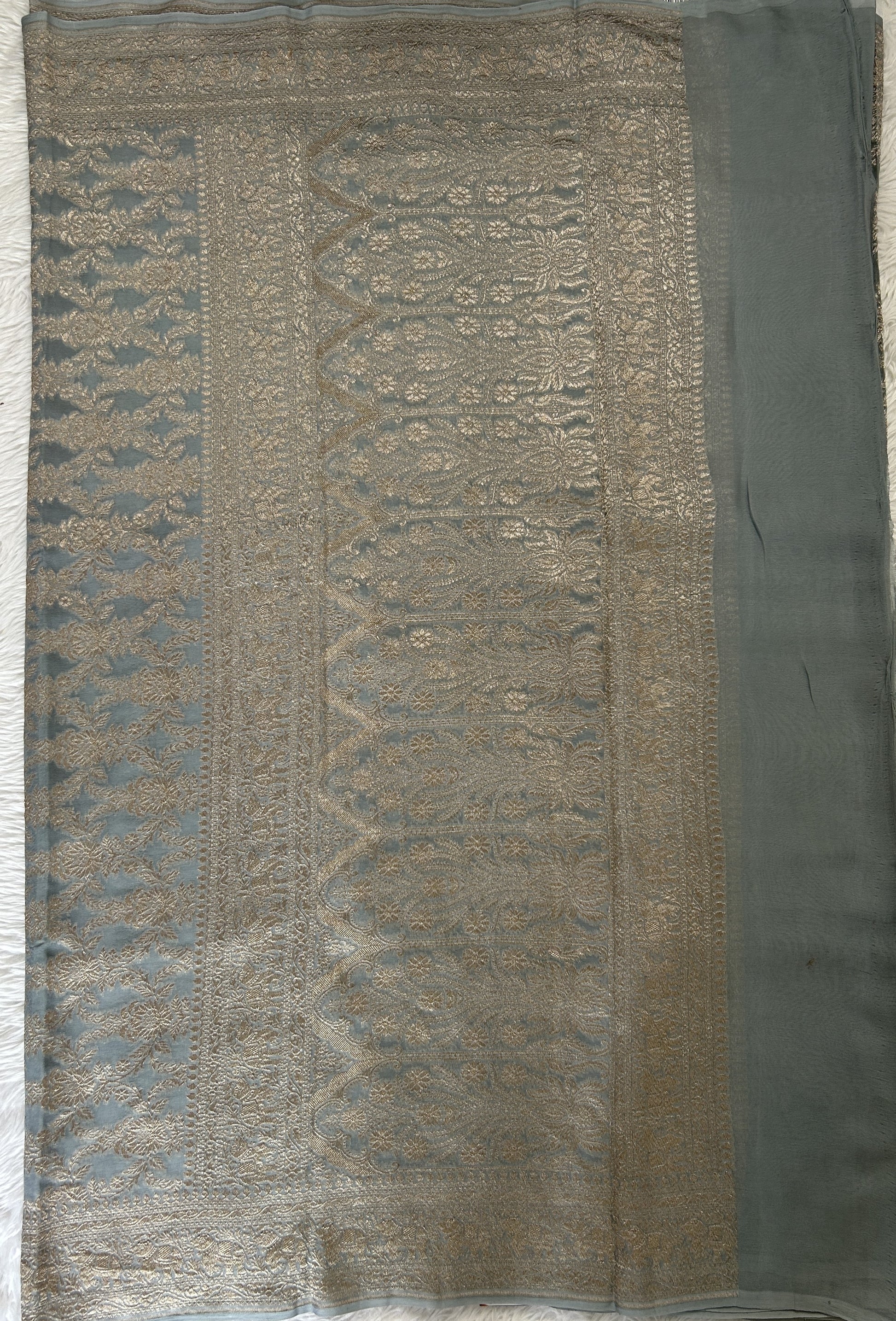 Banarasi Georgette Saree Gray Colored Complemented with a Zari Border. - Sampradaya Designer Studio