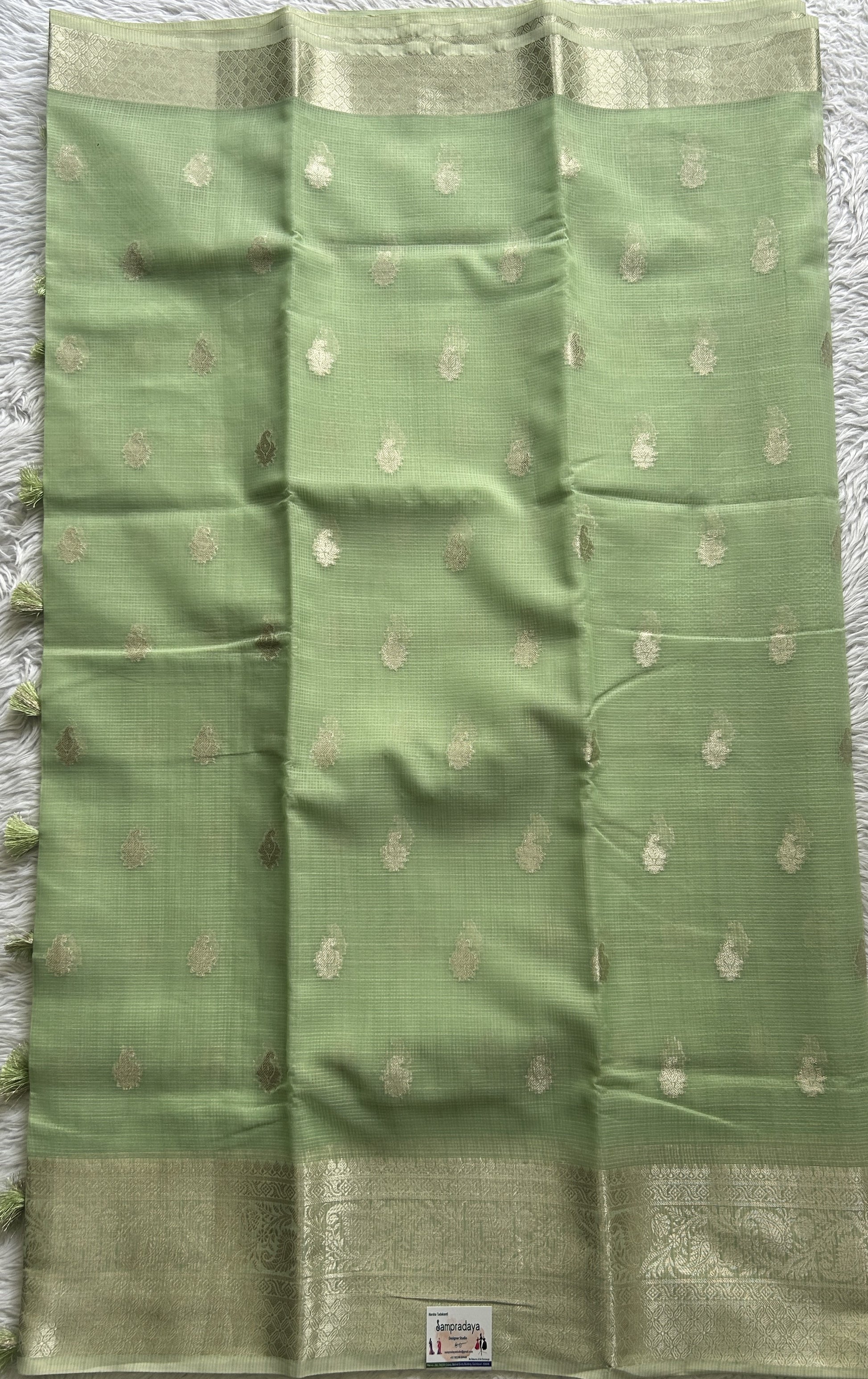 Silk kota Saree Light Green colored Complemented with a Zari Border. - Sampradaya Designer Studio