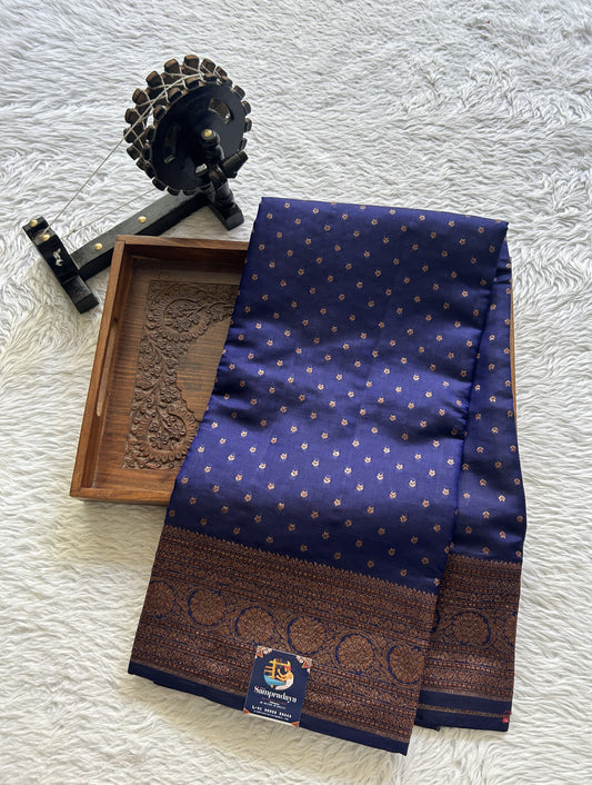 Raw Mango or Pooniya Silk Saree Ink Blue Colored Complemented With a Zari Border