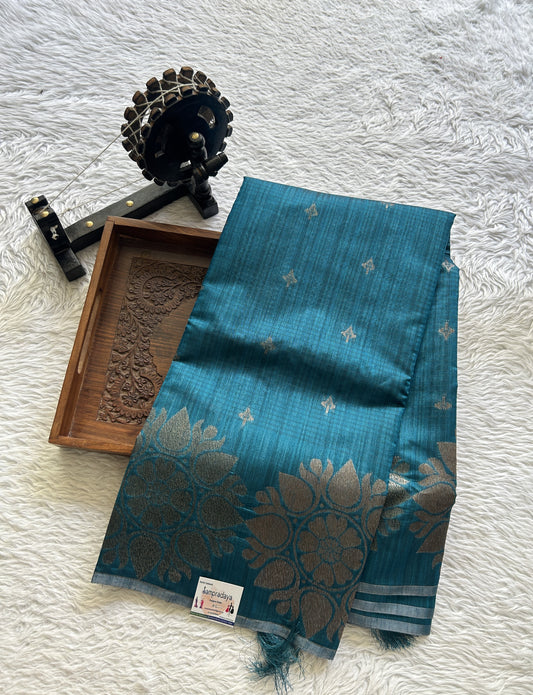 Semi Tussar Saree Teal Blue Colored complemented with a Borderless. - Sampradaya Designer Studio