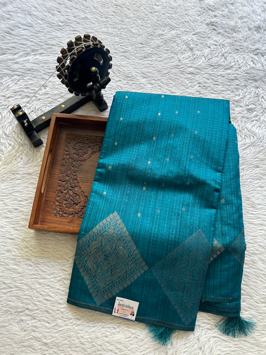 Semi Tussar Saree Peacock Blue Colored complemented with a Borderless. - Sampradaya Designer Studio