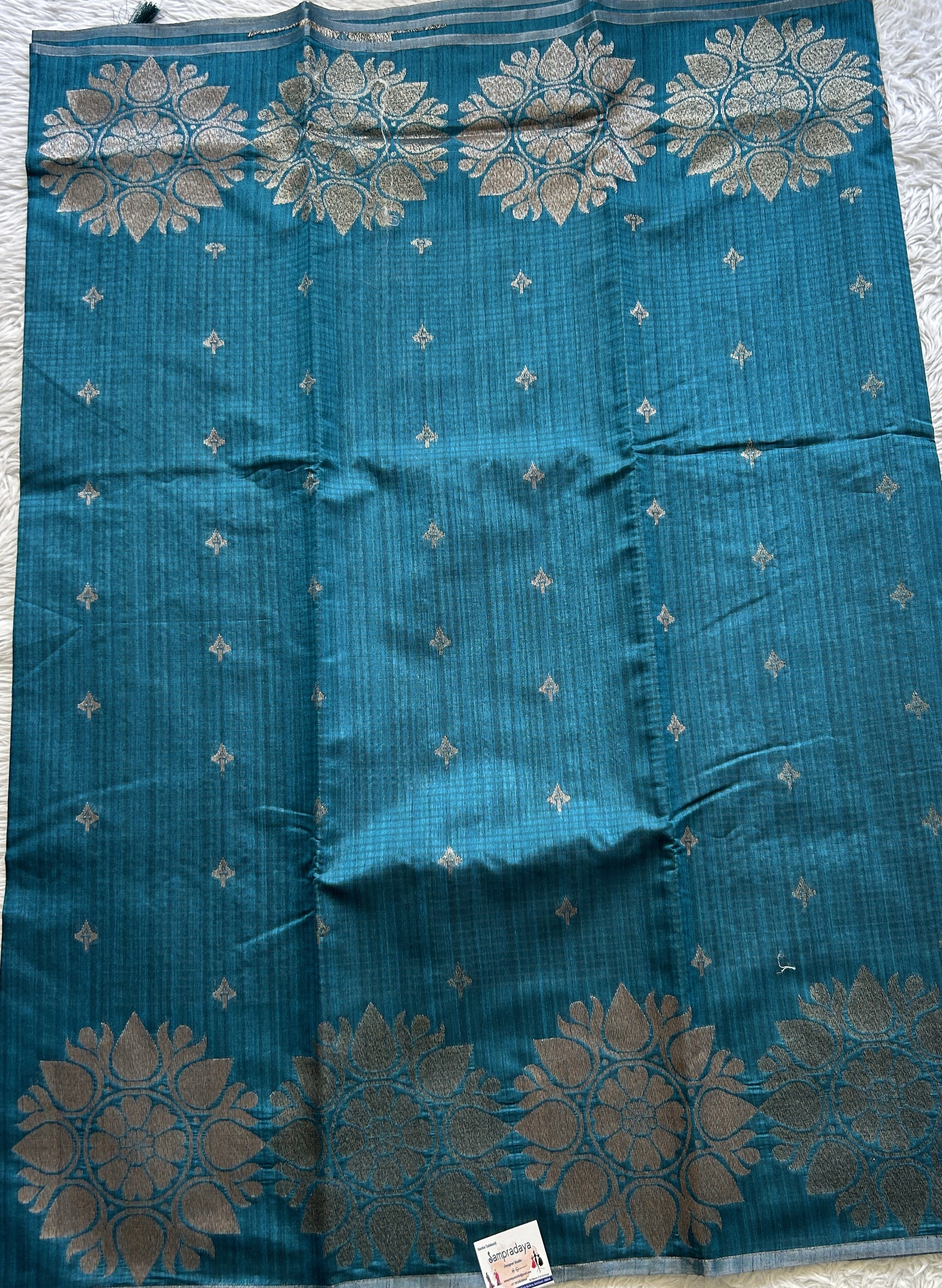 Semi Tussar Saree Teal Blue Colored complemented with a Borderless. - Sampradaya Designer Studio