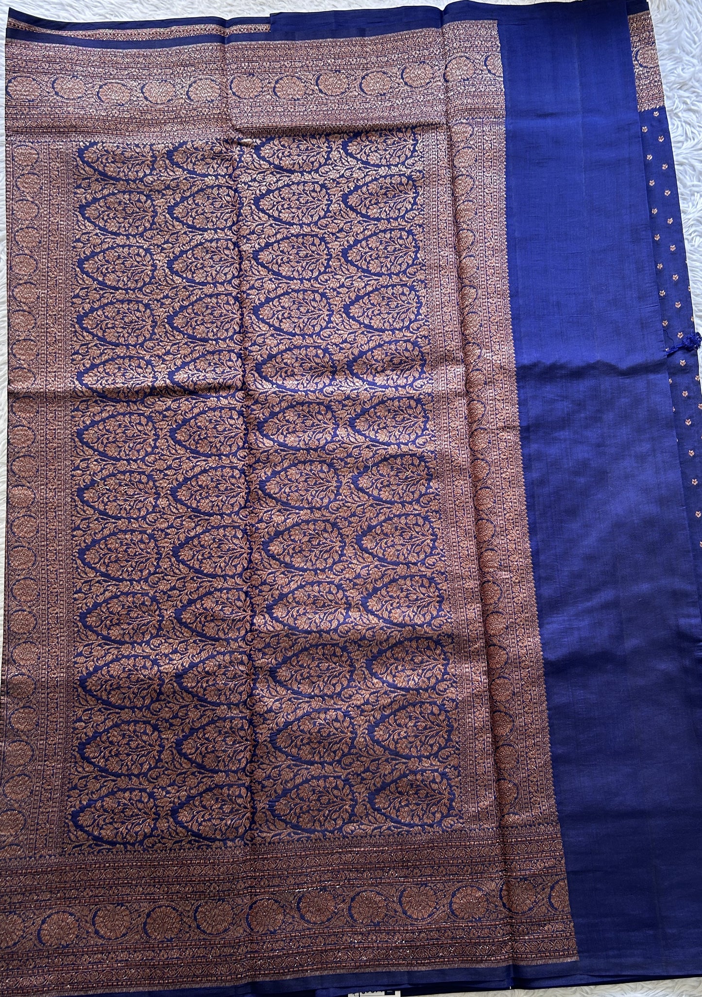 Raw Mango or Pooniya Silk Saree Ink Blue Colored Complemented With a Zari Border