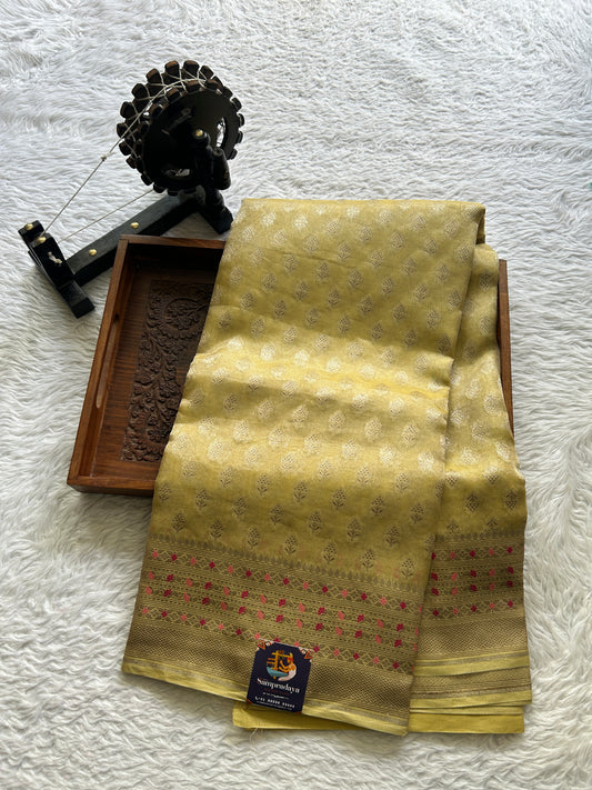 Banarasi Kora Tissue Saree Light Yellow Colored Complemented with a Zari Border. - Sampradaya Designer Studio