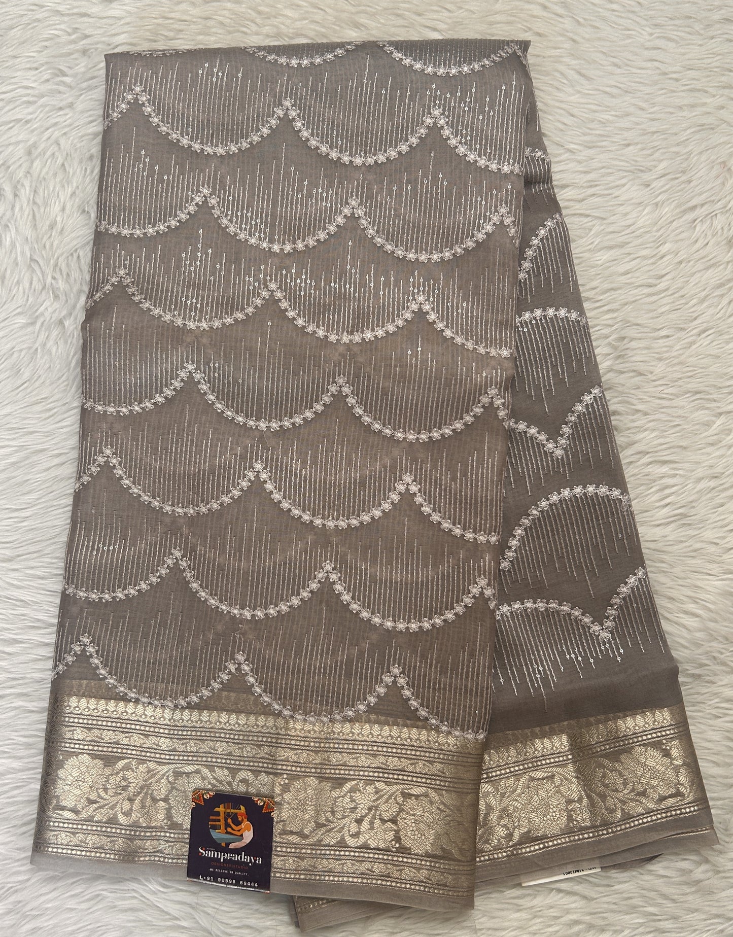 Banarasi Kora Silk Saree Dusty Lavender Colored Complemented with a Zari Border. - Sampradaya Designer Studio