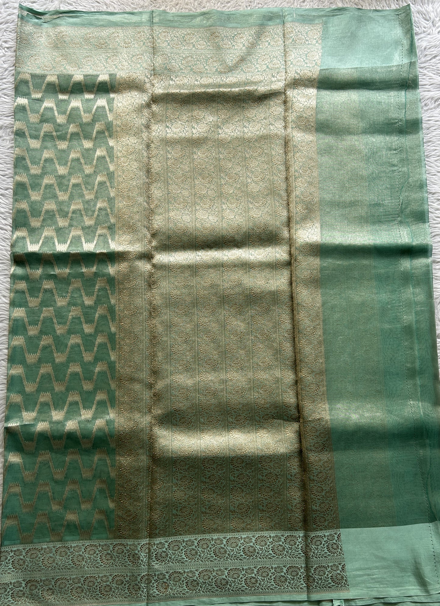 Banarasi Kora Tissue Saree Sea Green Colored Complemented with a Zari Border. - Sampradaya Designer Studio