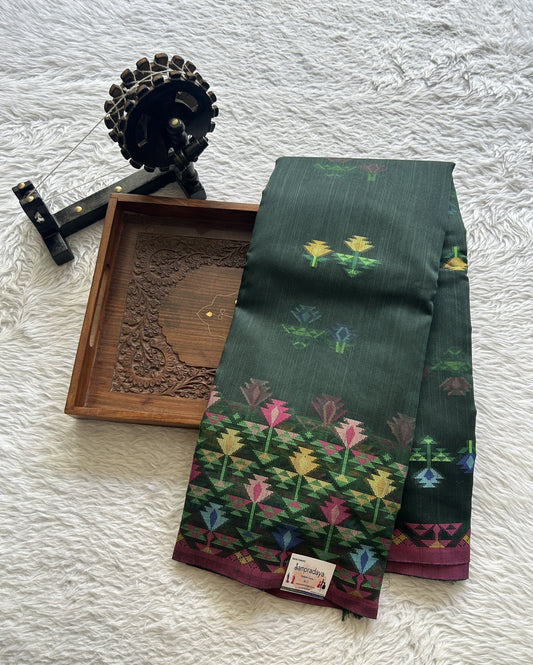 Semi Tussar Saree Bottle Green Colored Complemented with a Thread Border. - Sampradaya Designer Studio