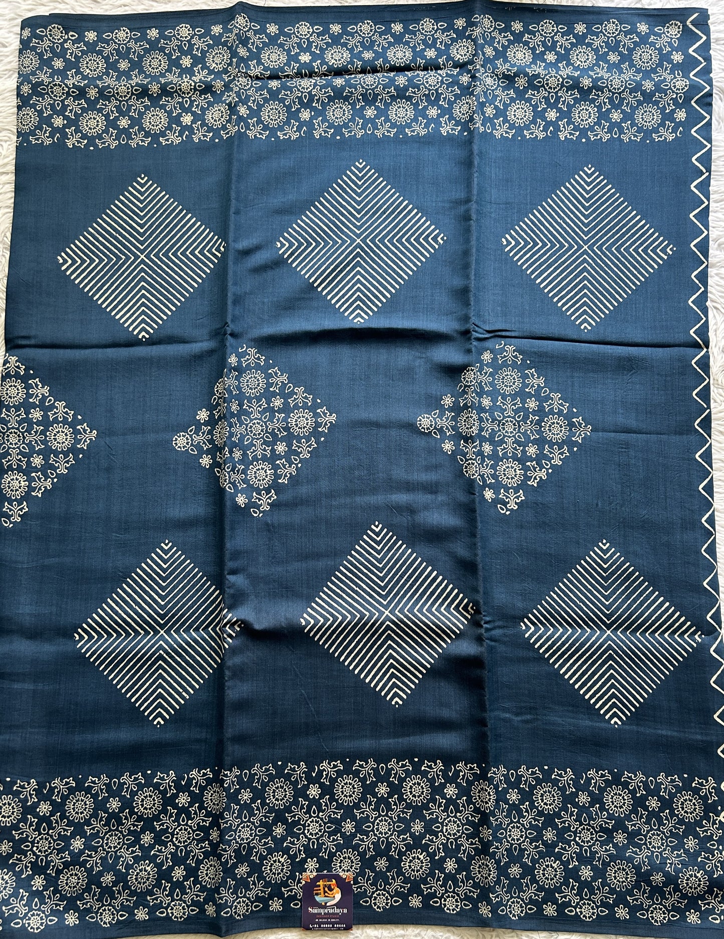 Banarasi Chiniya Silk Saree Teal Blue Colored Complemented with a Printed Border. - Sampradaya Designer Studio