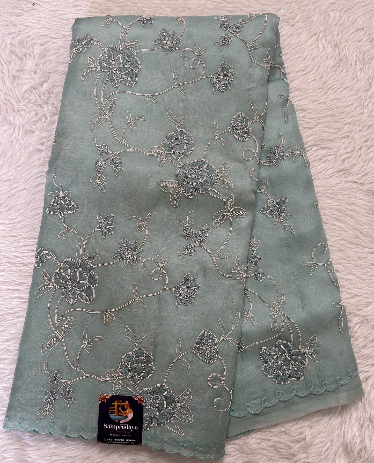 Banarasi Kora Silk Saree Sea Blue Colored Complemented with a Scallop Border. - Sampradaya Designer Studio