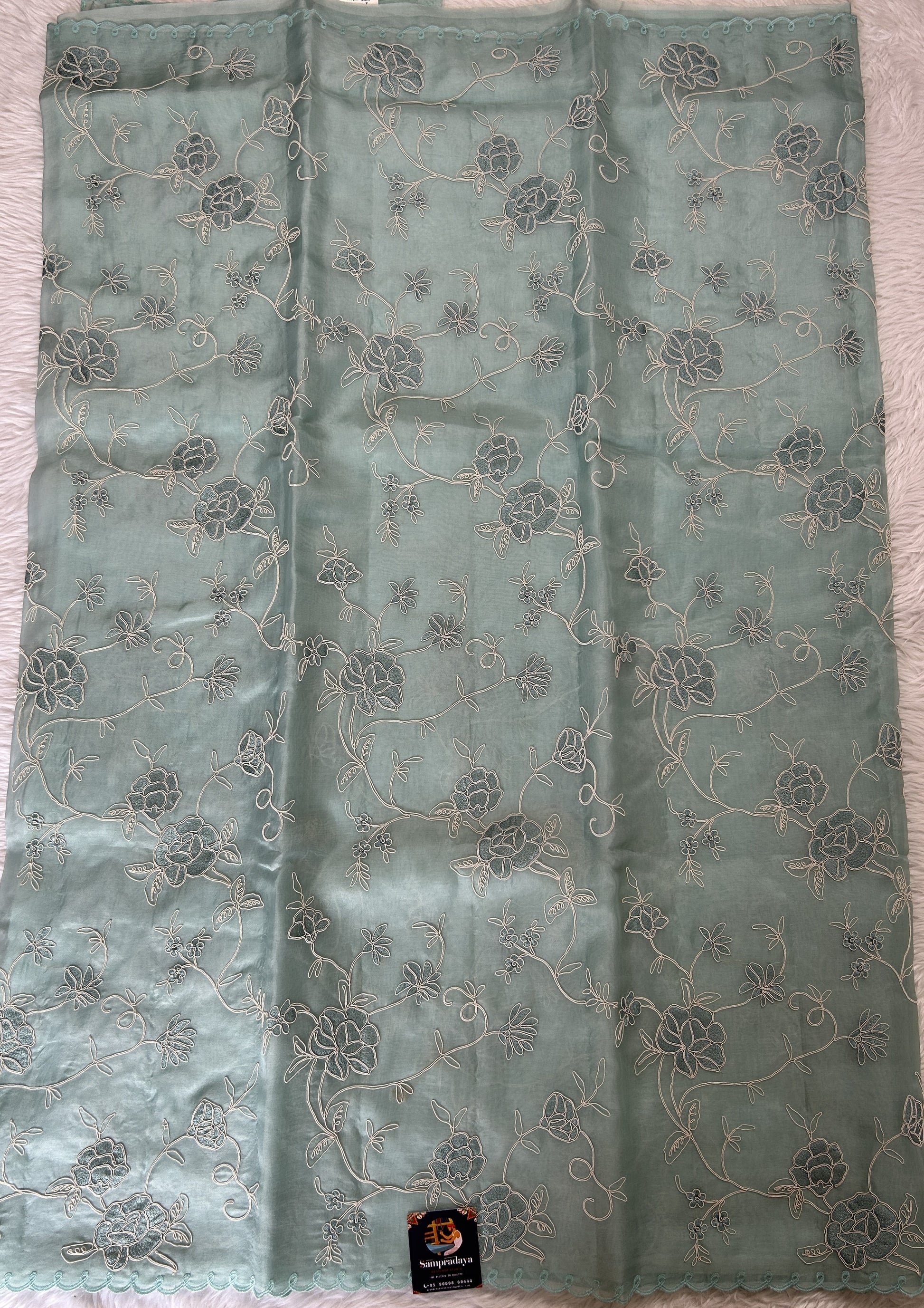 Banarasi Kora Silk Saree Sea Blue Colored Complemented with a Scallop Border. - Sampradaya Designer Studio