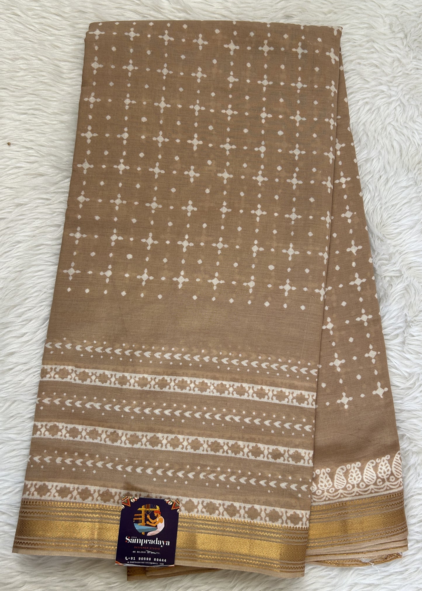 Banarasi Cotton Saree Light Brown Colored Complemented with a Zari Border. - Sampradaya Designer Studio