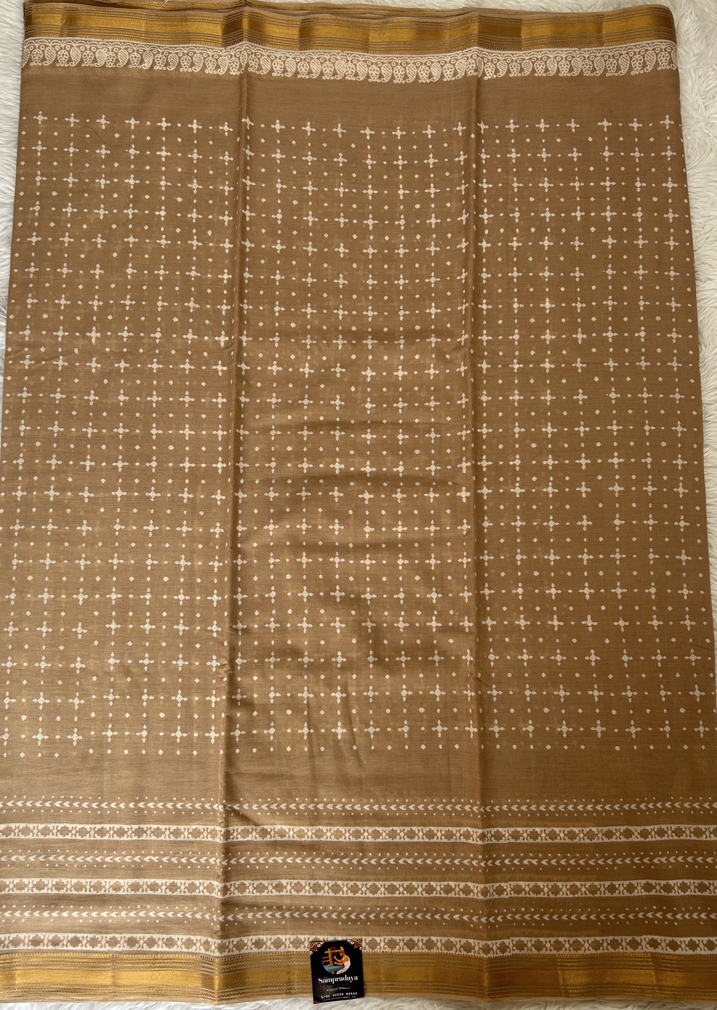 Banarasi Cotton Saree Light Brown Colored Complemented with a Zari Border. - Sampradaya Designer Studio