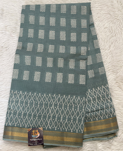 Banarasi Cotton Saree Light Sea Blue Colored Complemented with a Zari Border. - Sampradaya Designer Studio