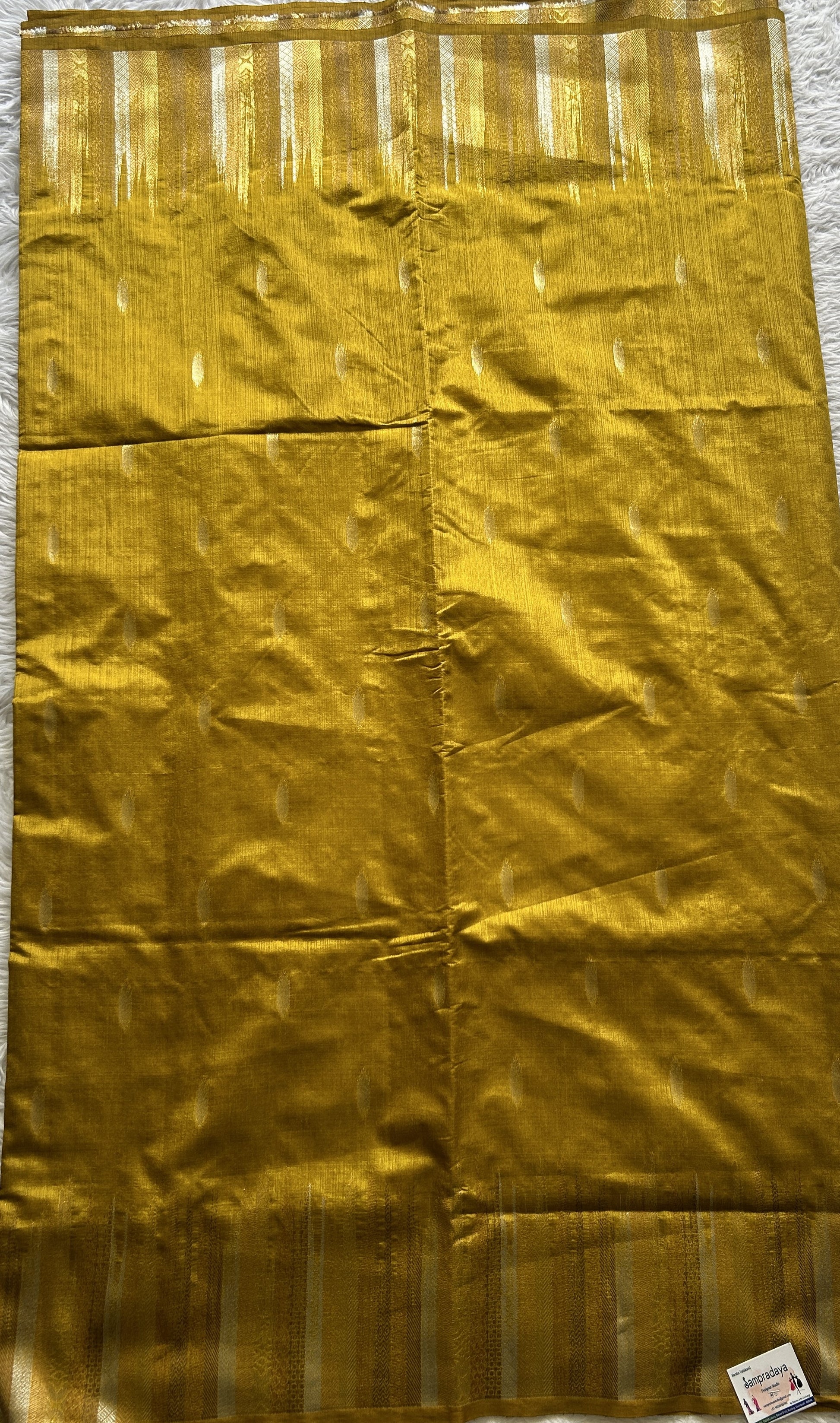 Semi Raw Silk Saree Mustard Yellow Colored Complemented with a Zari Border. - Sampradaya Designer Studio